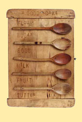 a good cake - unusual handmade cupboard made from chopping boards & kitchenalia